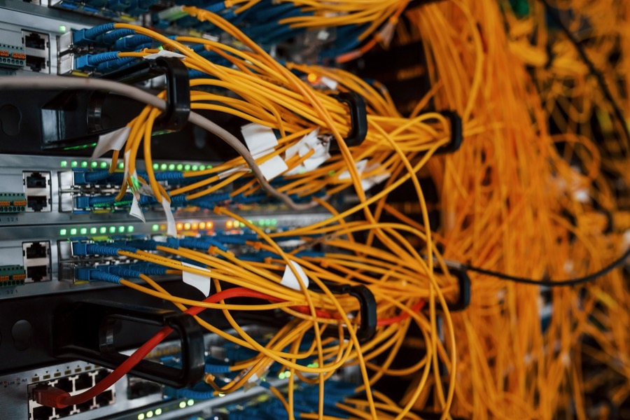 close up view of internet equipment and cables in the server room